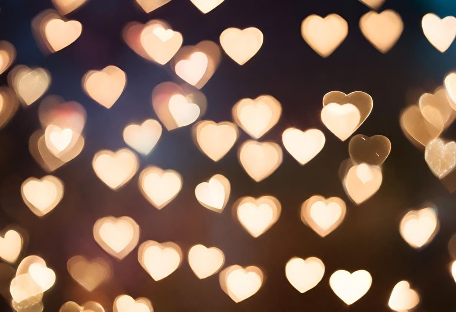 Heart-shaped bokeh lights creating a romantic atmosphere, perfect for Valentine's Day celebrations.