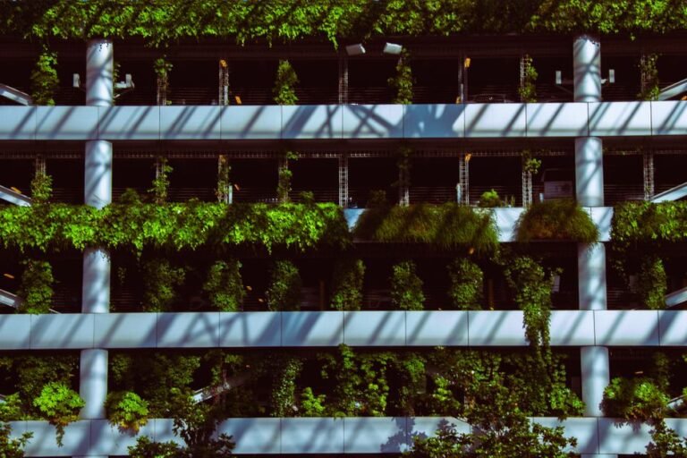 Modern facade with lush vertical garden in Portland, showcasing urban greenery.