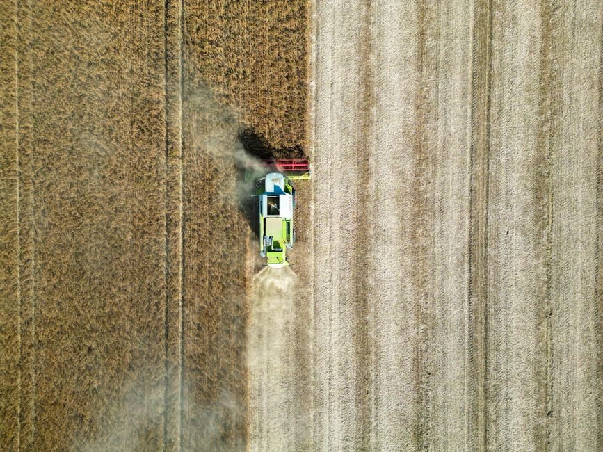 Drone shot of a combine harvester working in a wheat field in Garešnica, Croatia.